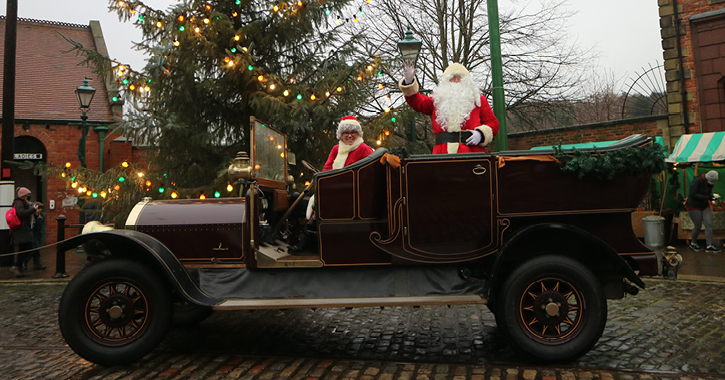 Father Christmas in an historic car at Beamish Museum